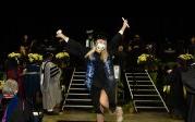 Students could not contain their excitement as they walk off the stage. 图Chuck Thomas/ODU